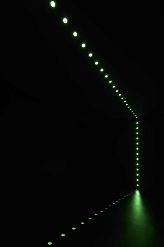 green lights in dark space