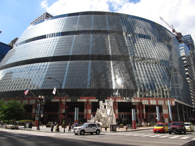 exterior of Chicago's Thompson Center, showing a large, round building clad in glass