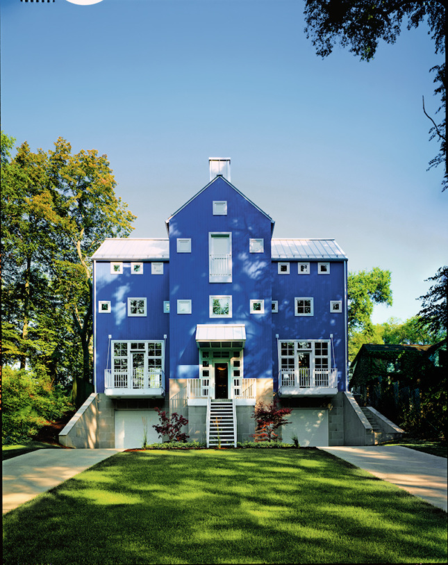 a postmodern house painted in blue