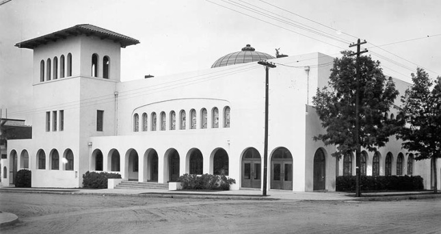 Black and white photograph of a squat modern building