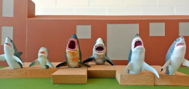 Multiple shark sculptures