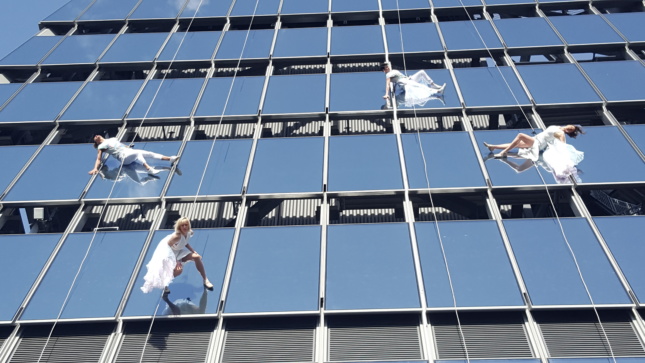 aerial dancers on a skyscraper
