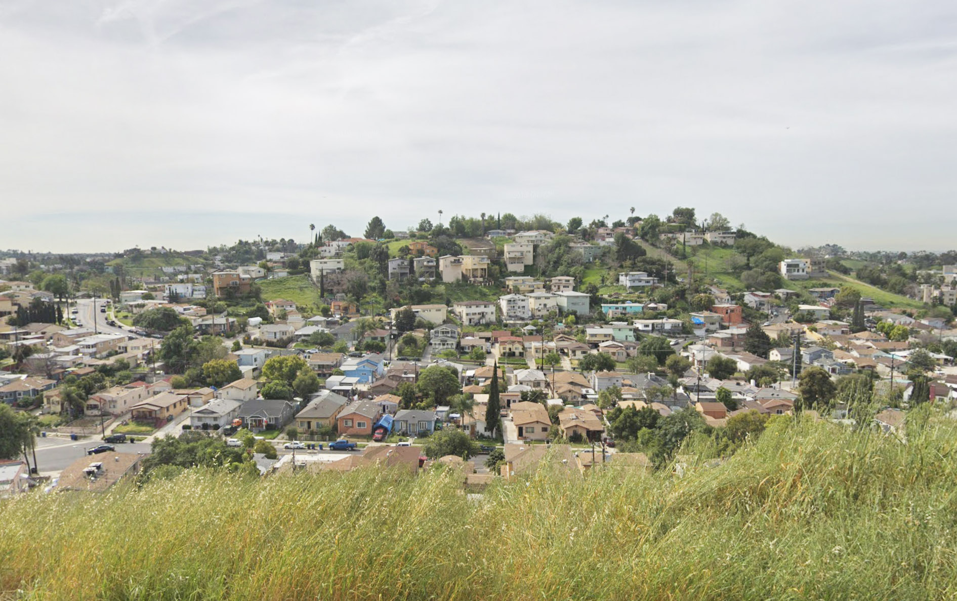 hills with several homes and streets