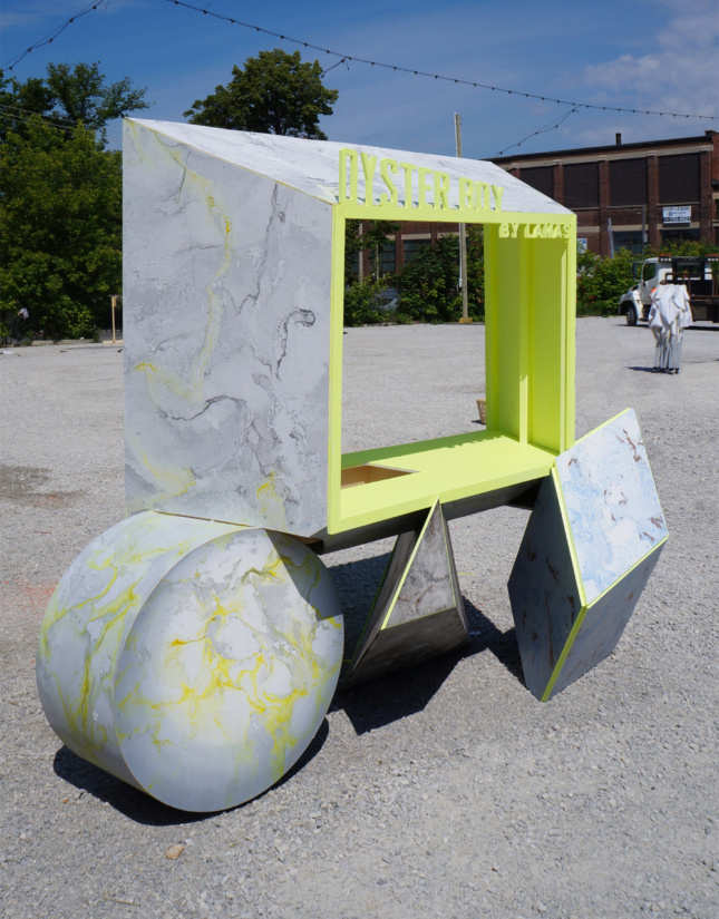 An abstract food cart made from stone