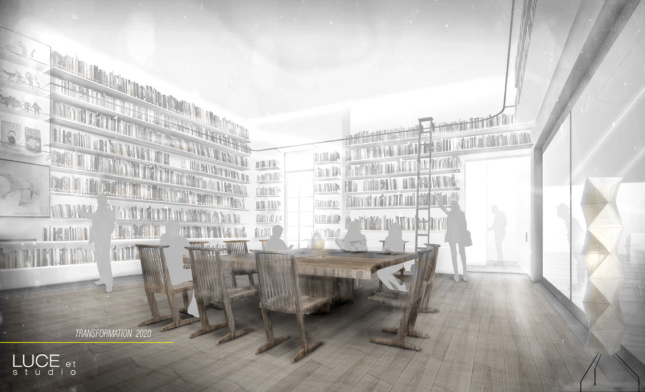 table and chairs in front of books