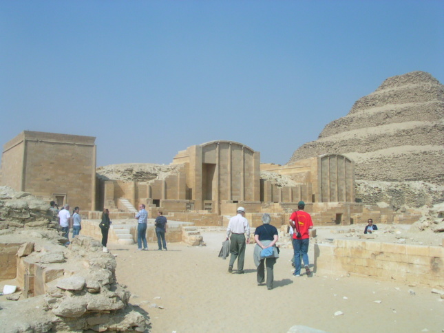 A group of tourists wandering around the Pyramid of Djoser