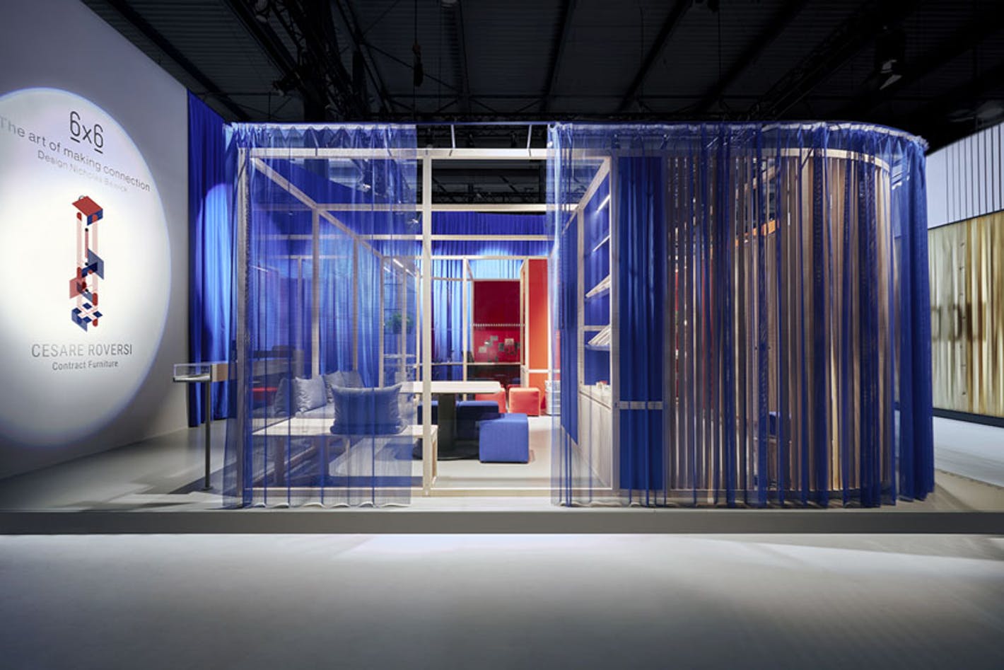living room gallery installation surrounded by translucent blue fabric