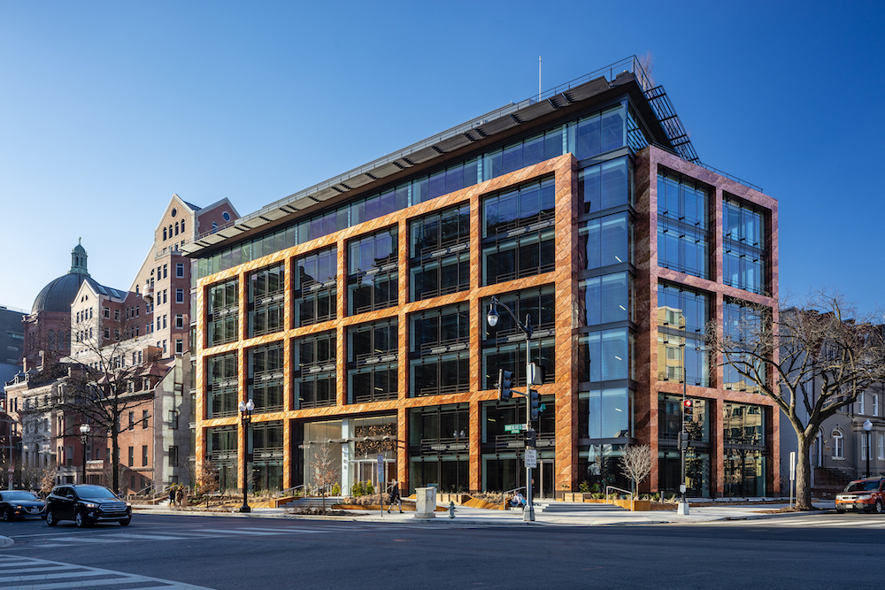 Exterior image of 1701 Rhode Island Avenue and its facade of copper and glass