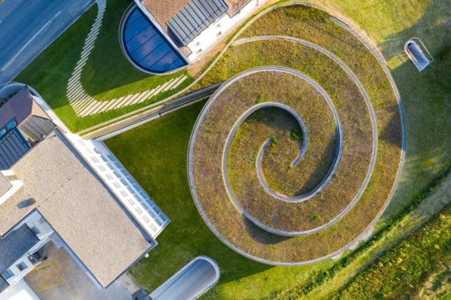 Aerial view of a spiral green roof