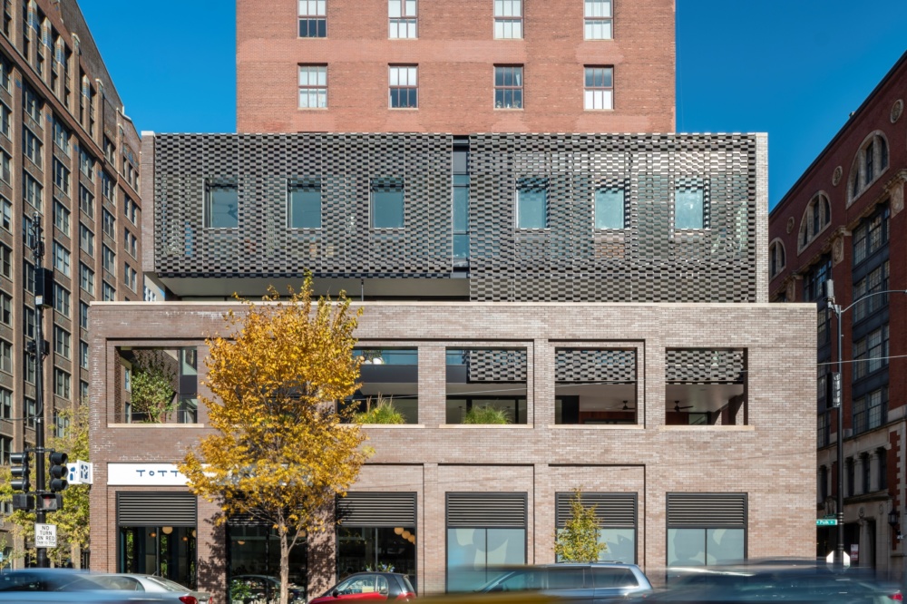 Exterior image of the Dearborn Residence and its brick and terra-cotta facade