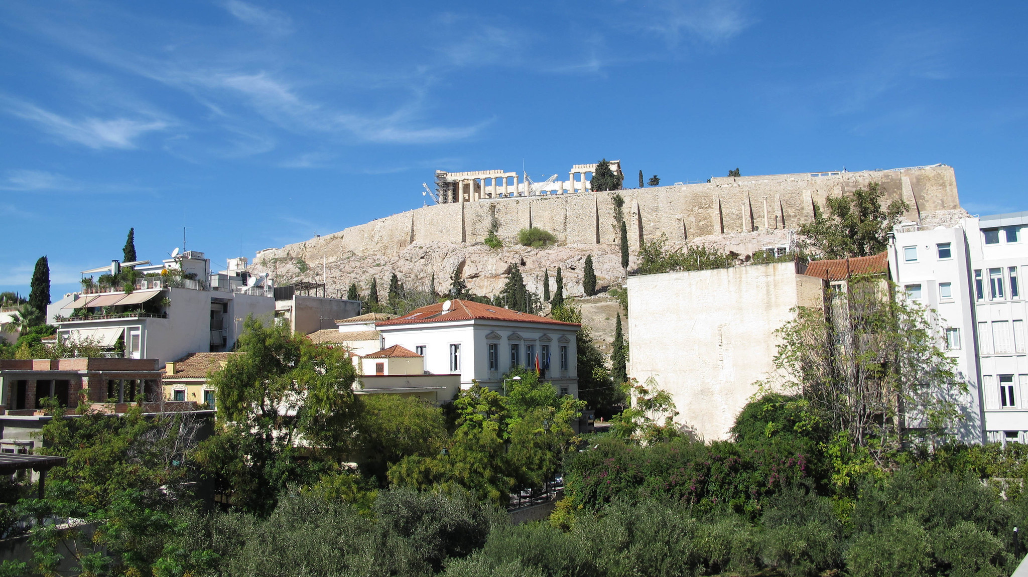 a view of the Acropolis in Athens on a sunny day