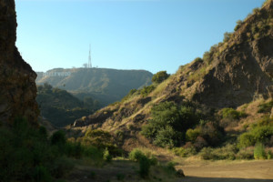 a view of the hollywood sign bronson canyon in los angeles, from griffith park