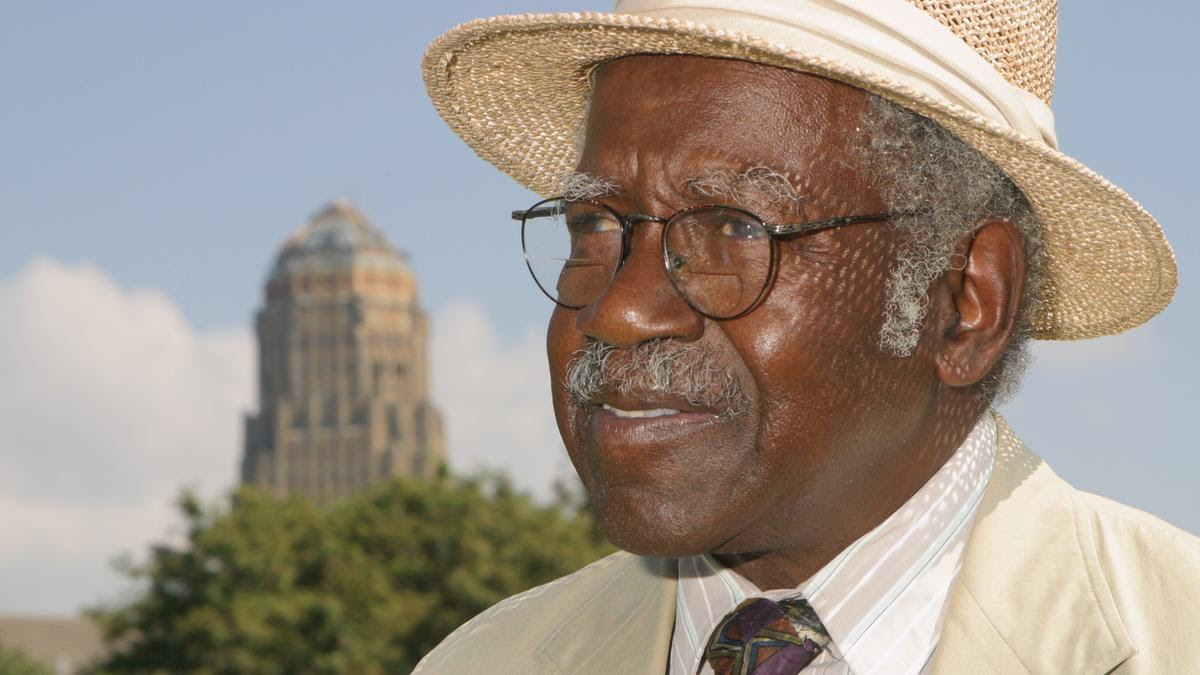An elderly African-American man, Robert Coles