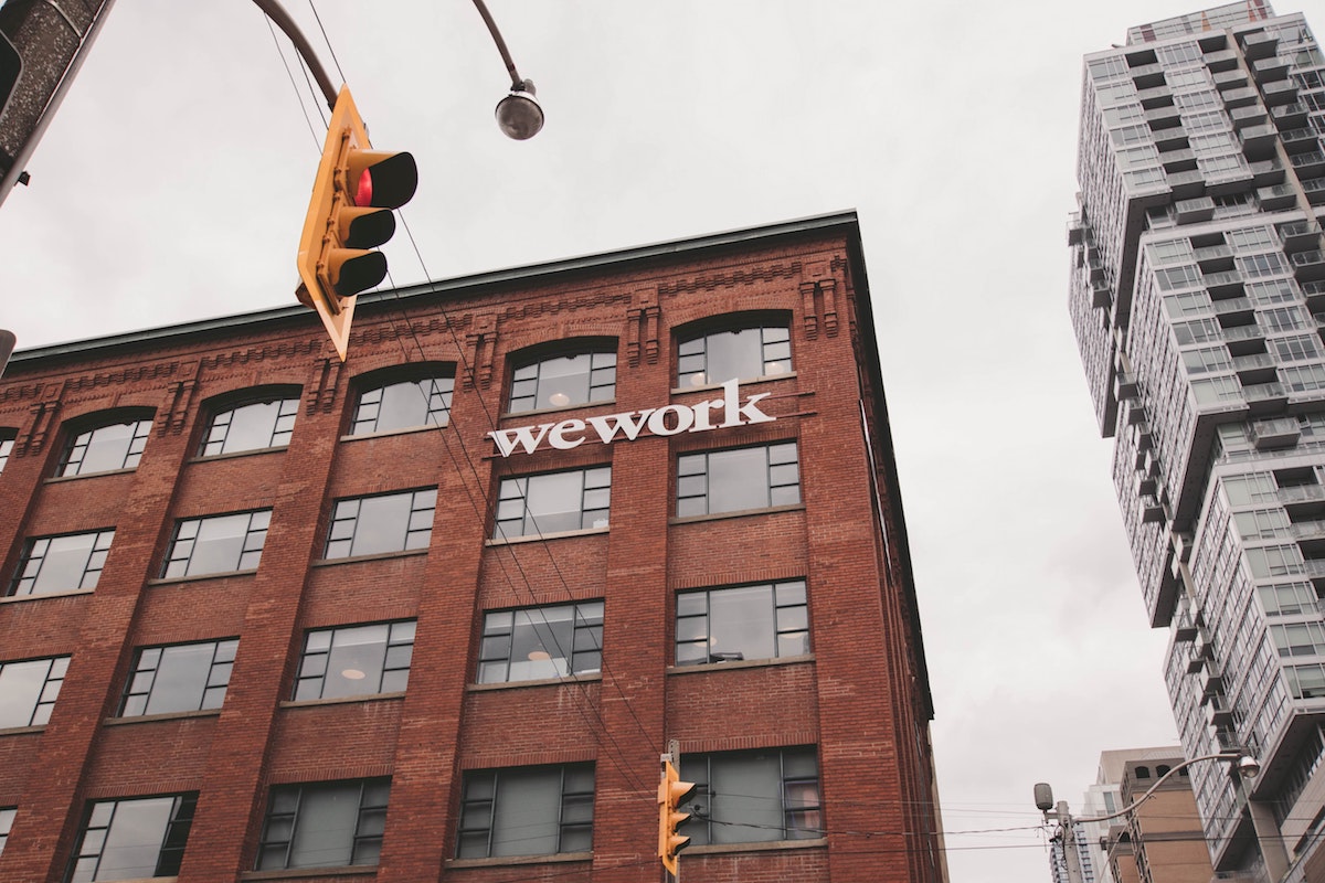 a brick building with a wework sign