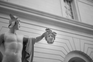 Photograph of statue of Perseus holding Medusa's head in the Metropolitan Museum of Art, a now-closed cultural institutions