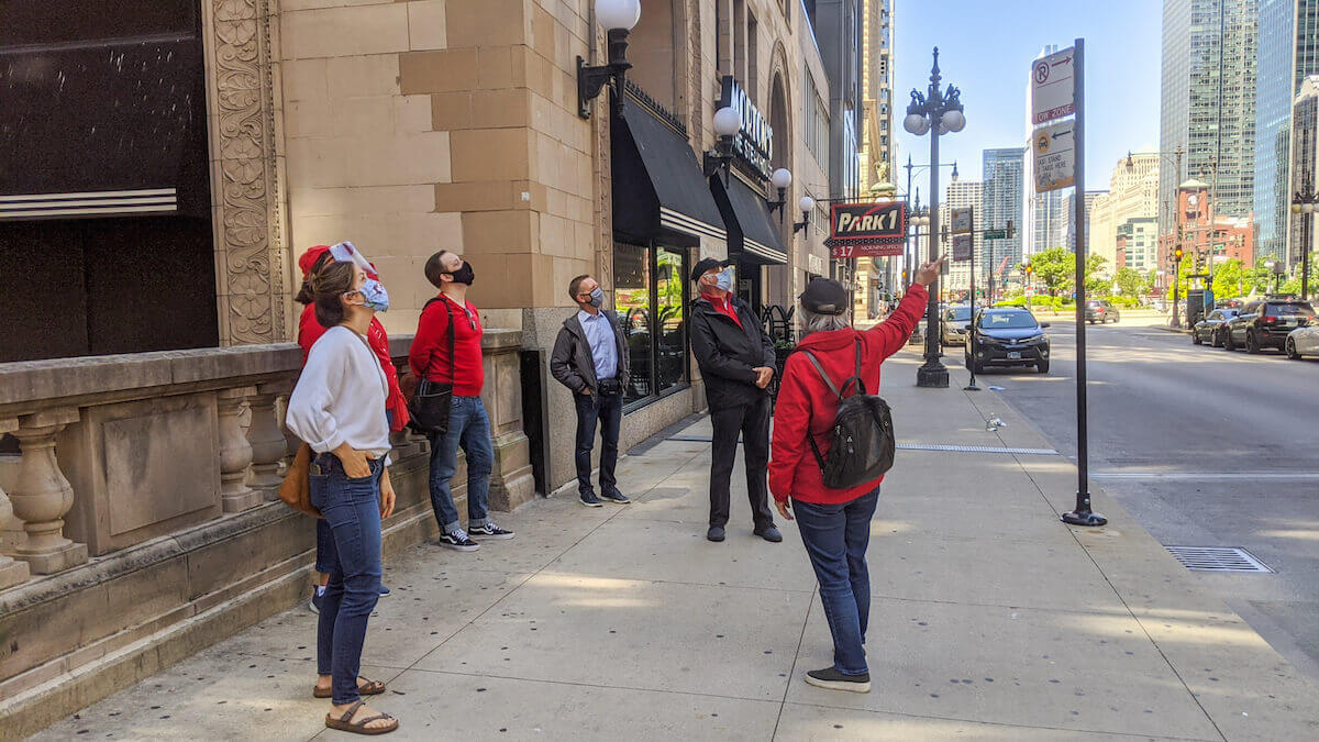 a group attends an architectural walking tour of chicago