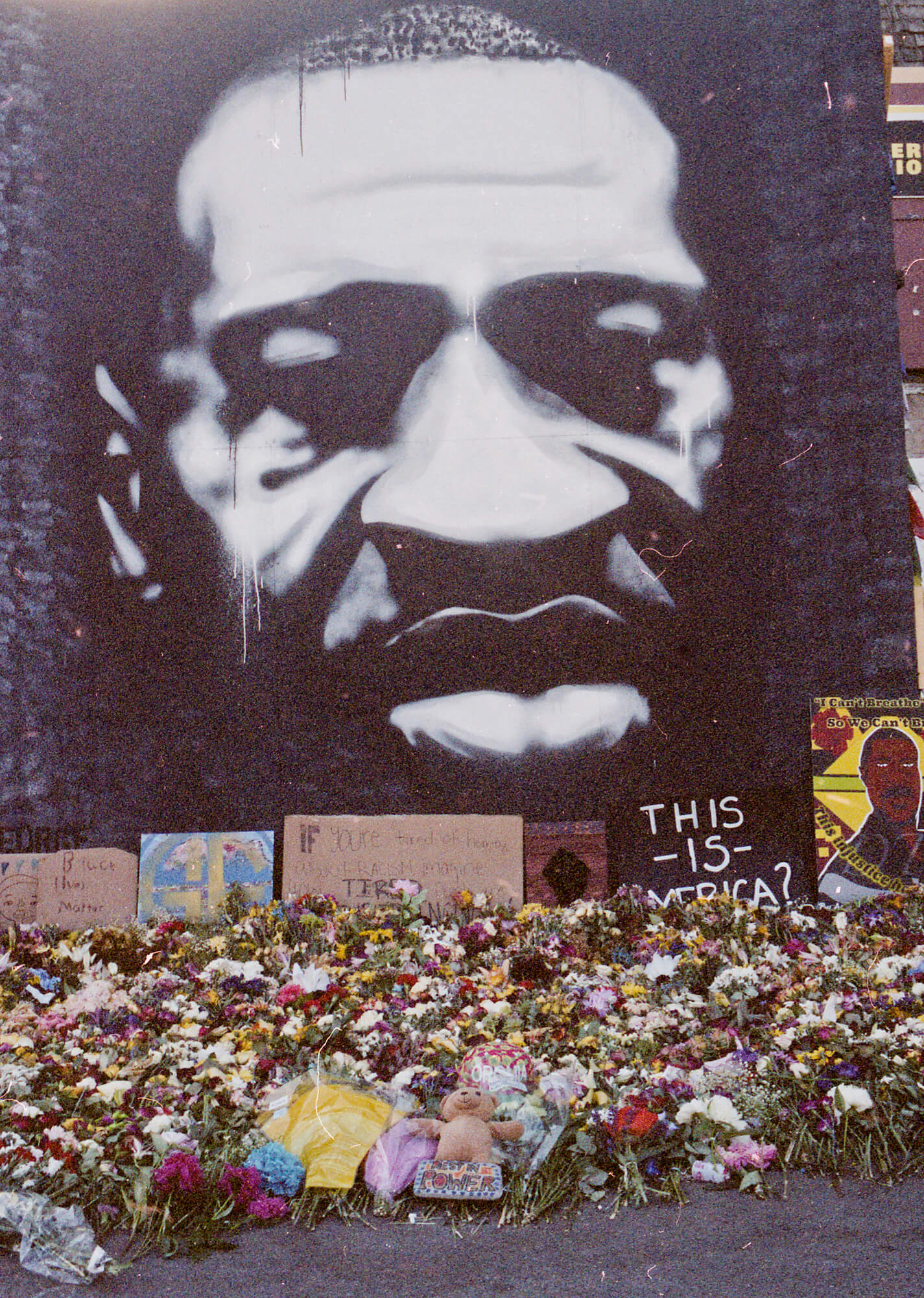 A black-and-white mural of George Floyd in Minneapolis