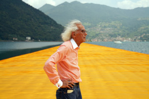 Photo of Christo standing on tensile yellow fabric