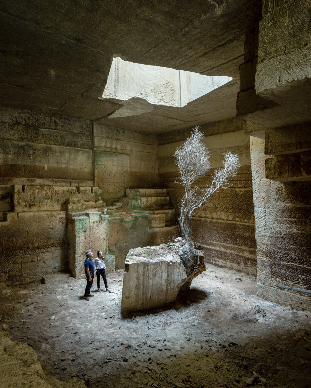 Picture of two people inside of a quarry