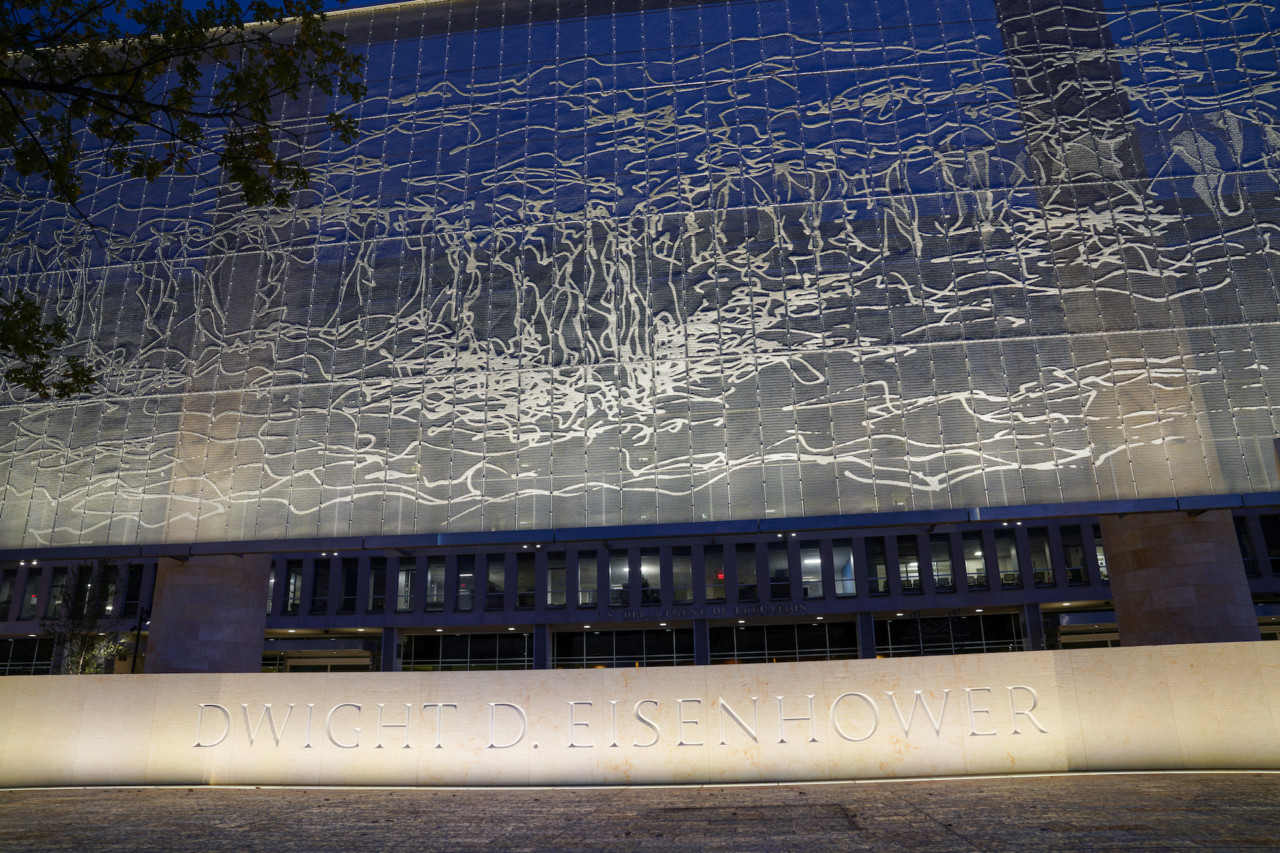 a stainless steel tapestry at night