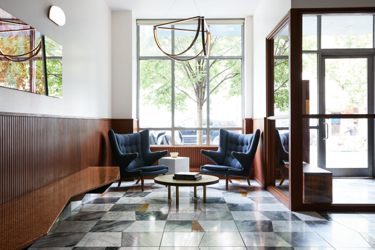A lobby overhauled by GRT architects with zigzagging marble