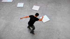 A man skateboarding on top of art
