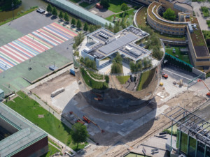 aerial view of a mirrored, bowl-shaped building in the netherlands