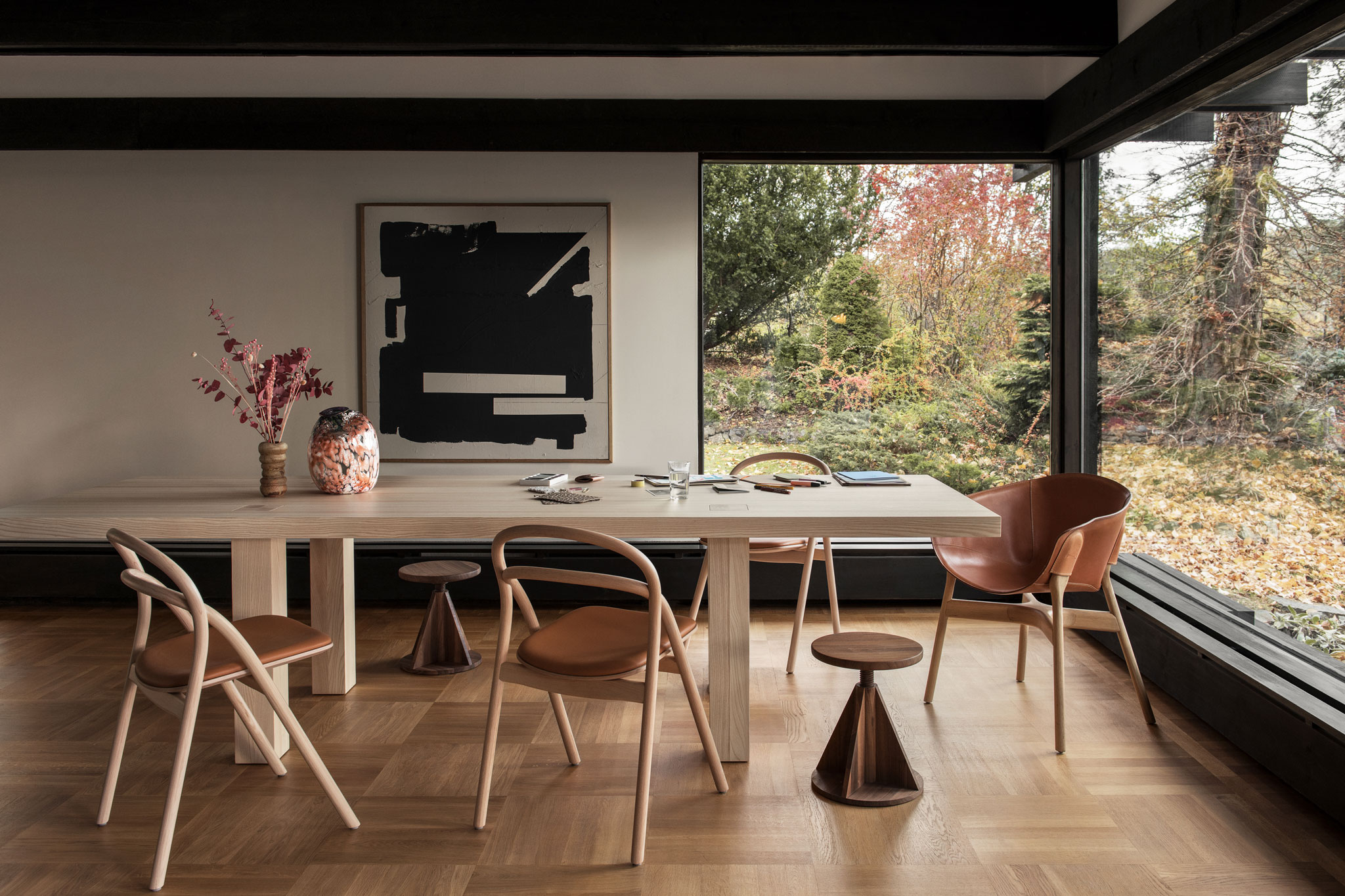 Wood chairs around a table, a 2020 best of products awards winner