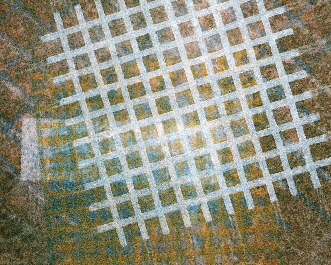 grid pattern on grass
