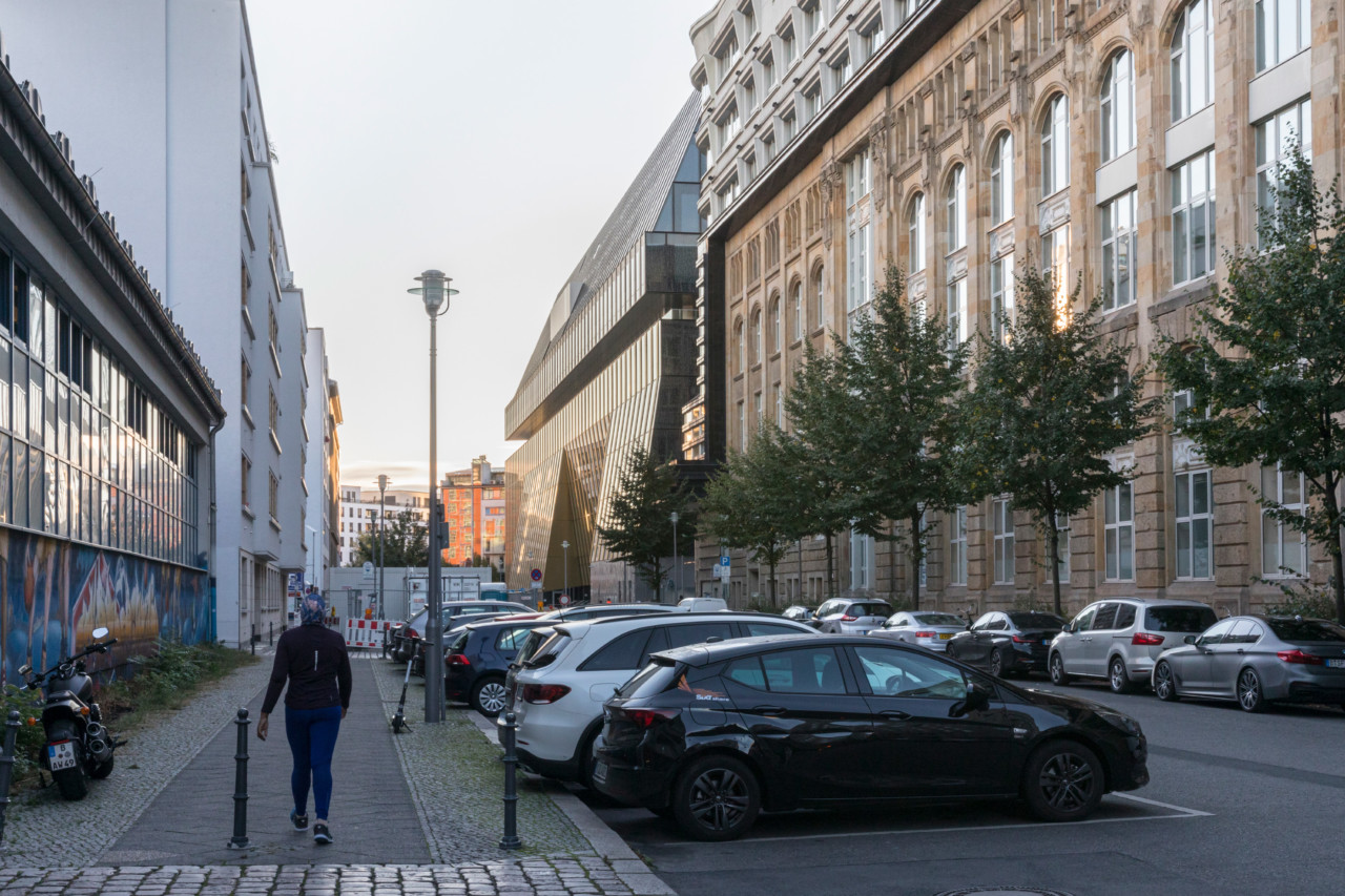 looking down a berlin street at the axel springer campus