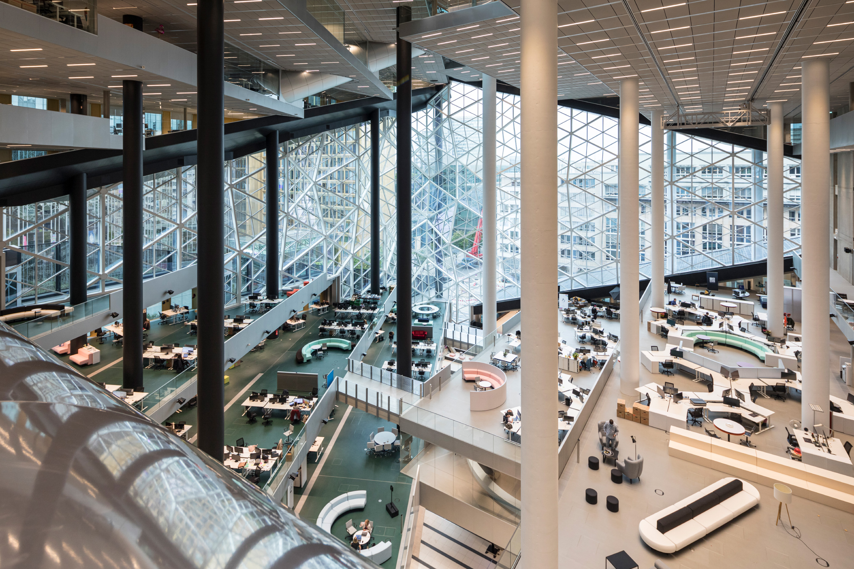 Interior of the new Axel Springer building looking out to a diamond shaped atrium