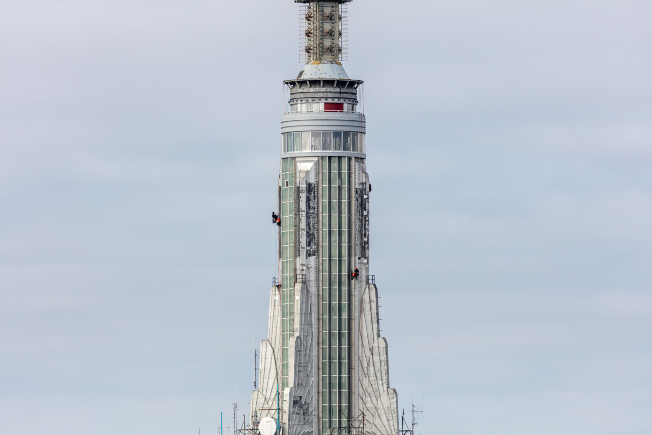 Image of the spire and construction workers
