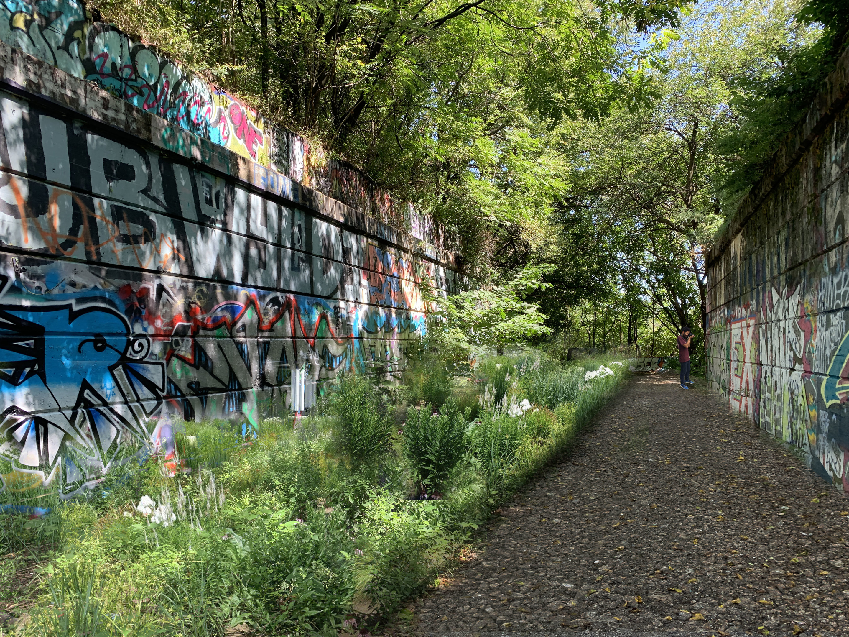 Rendering of a throughway with graffiti