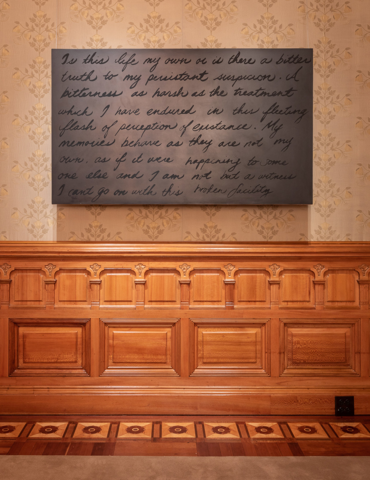 Painting of a letter on the wall at the Driehaus museum