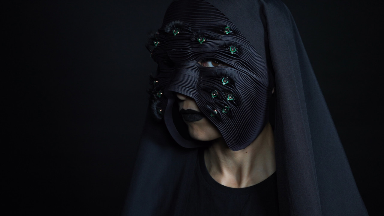 photo of a woman in a hood