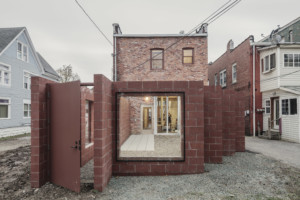 A red brick patio enclosure designed designed by Davidson Rafailidis by Davidson Rafailidis