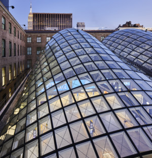 close up of a diagrid steel and glass ceiling atop the new moynihan train hall
