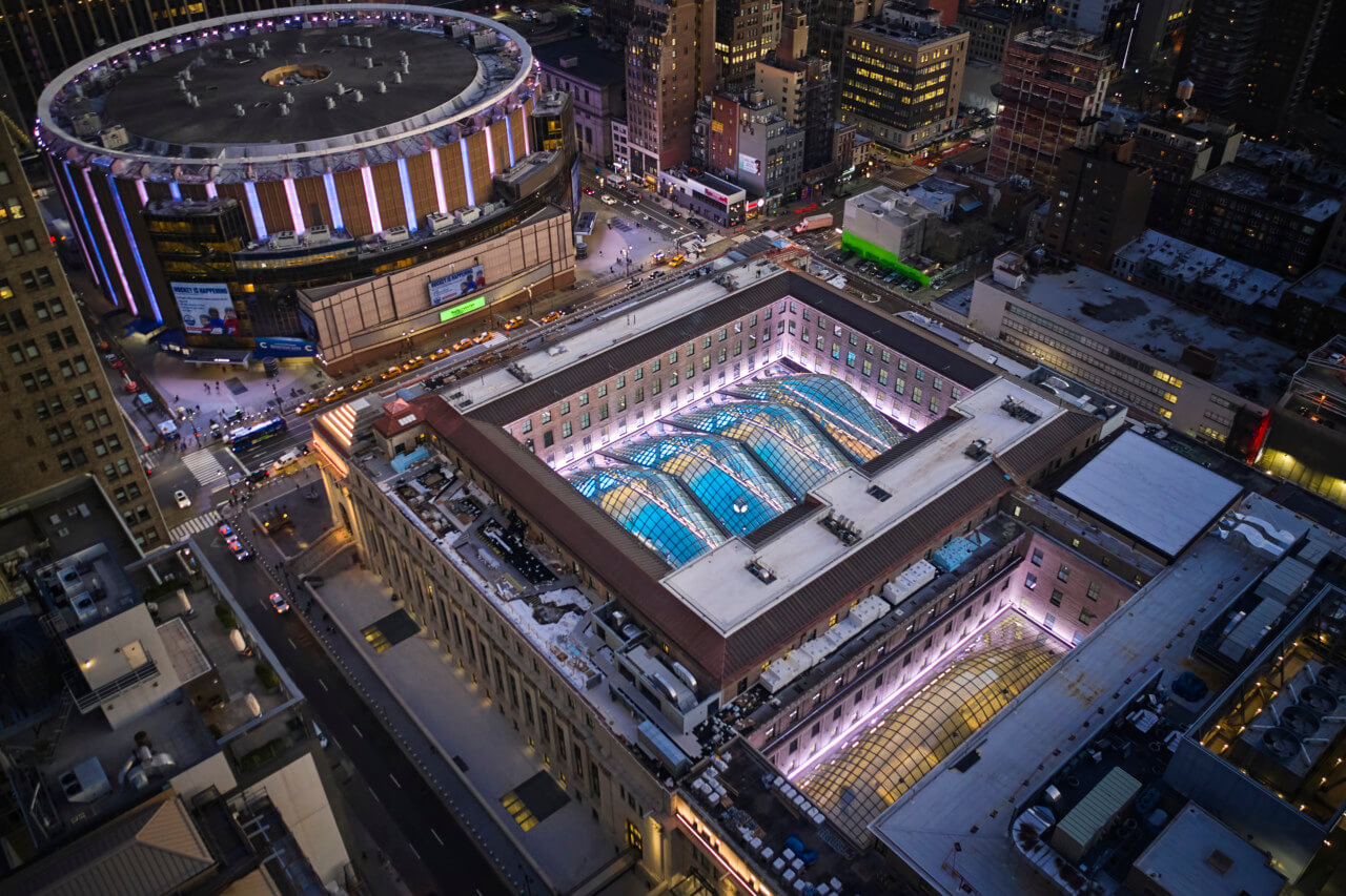Drone image of madison square garden and the new glass-topped moynihan train hall
