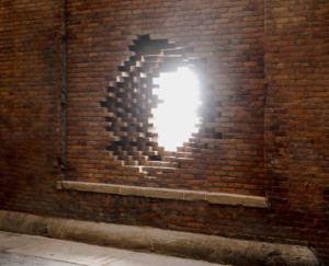 a portal in a brick wall