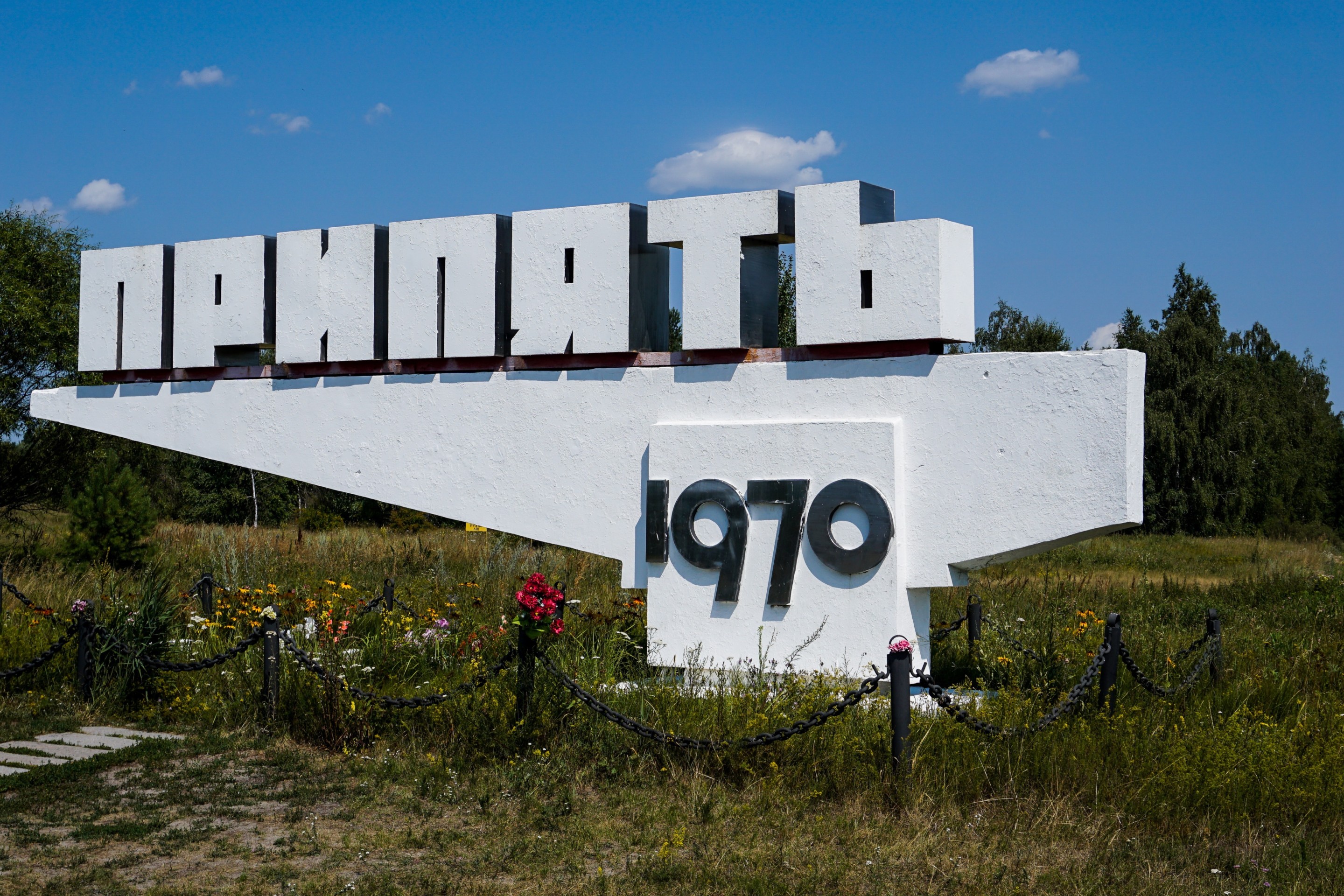 a sign announcing the ghost time of pripyat 
