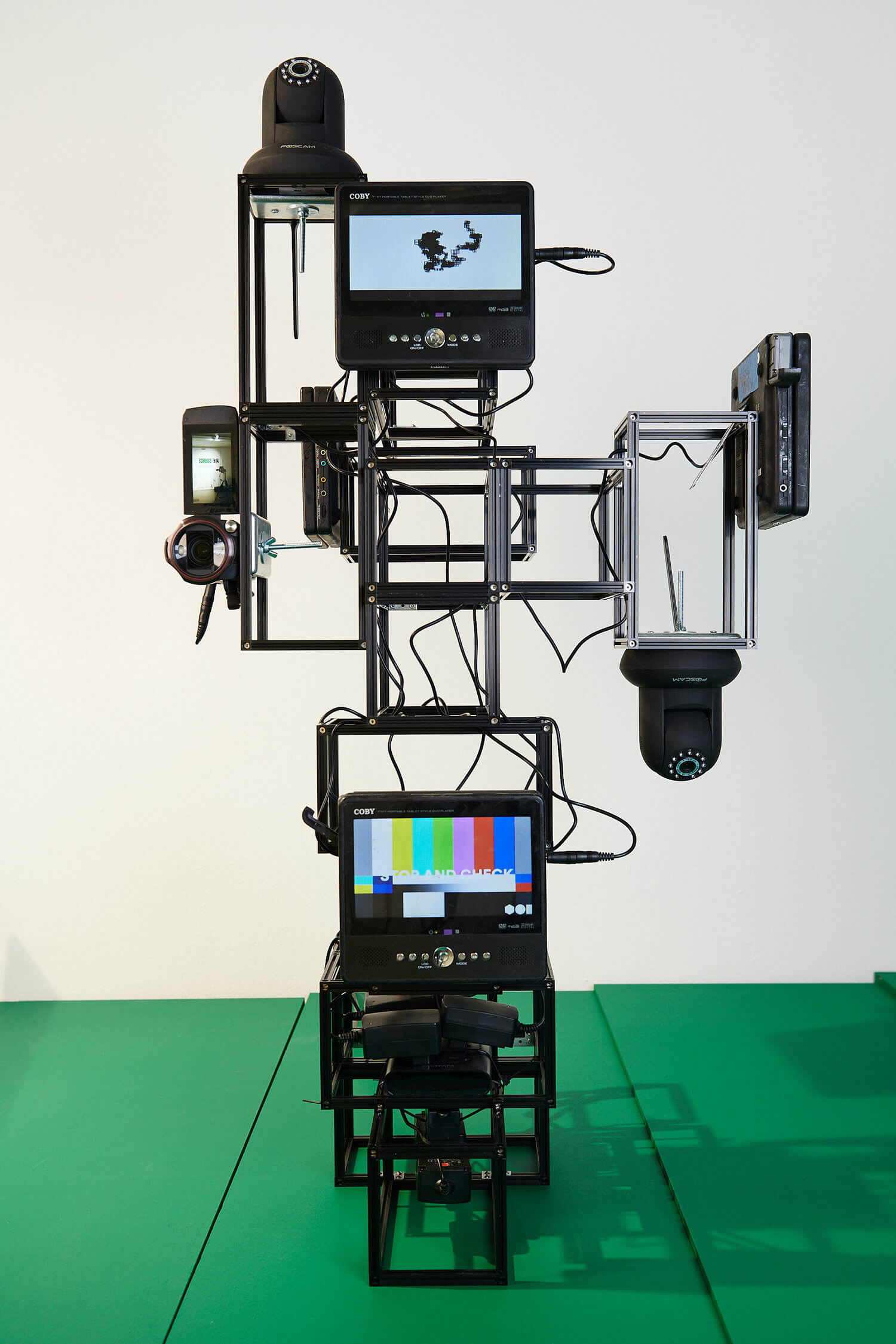 vertical camera arrangement showing screens and lenses