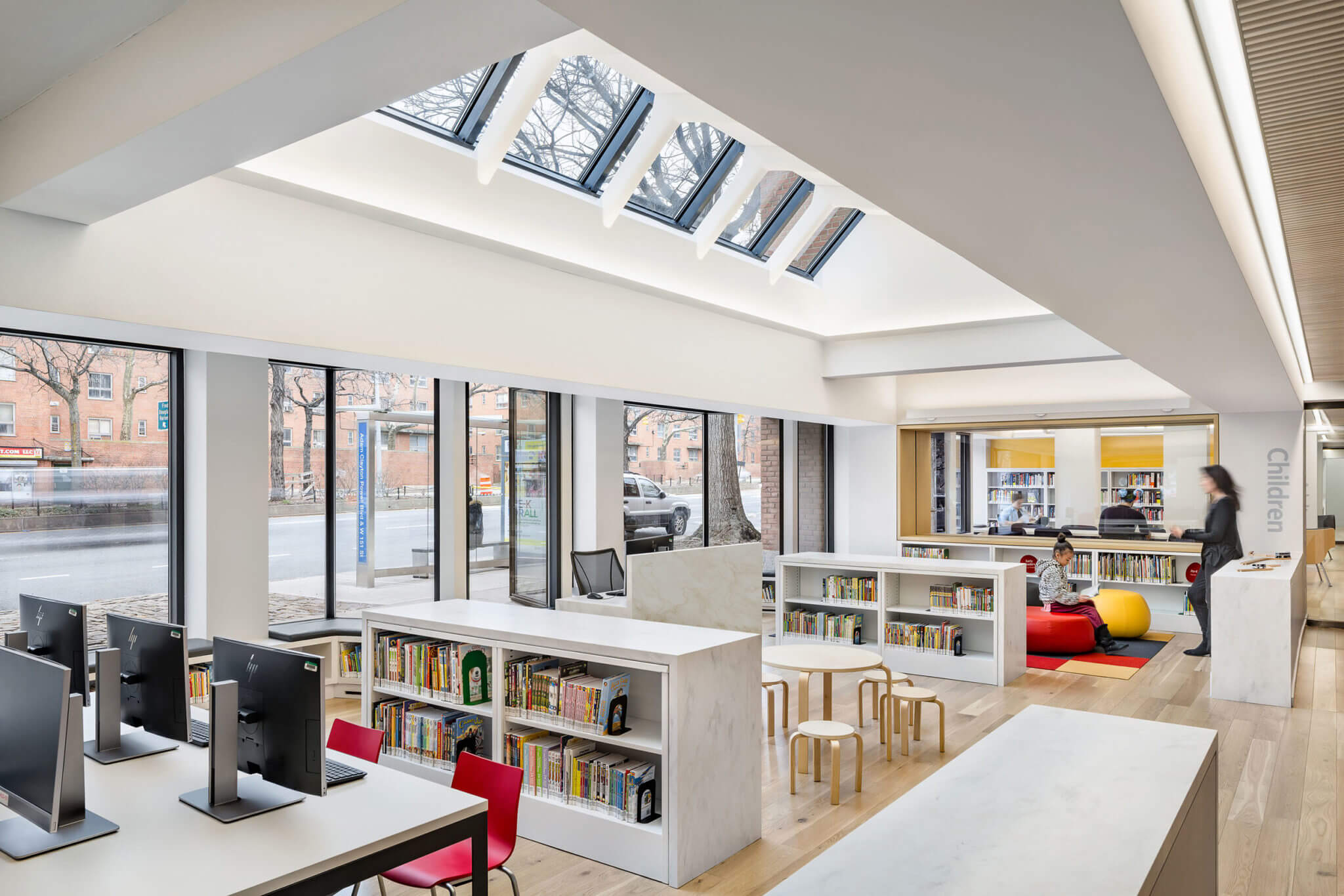 Interior of a white library with skylight