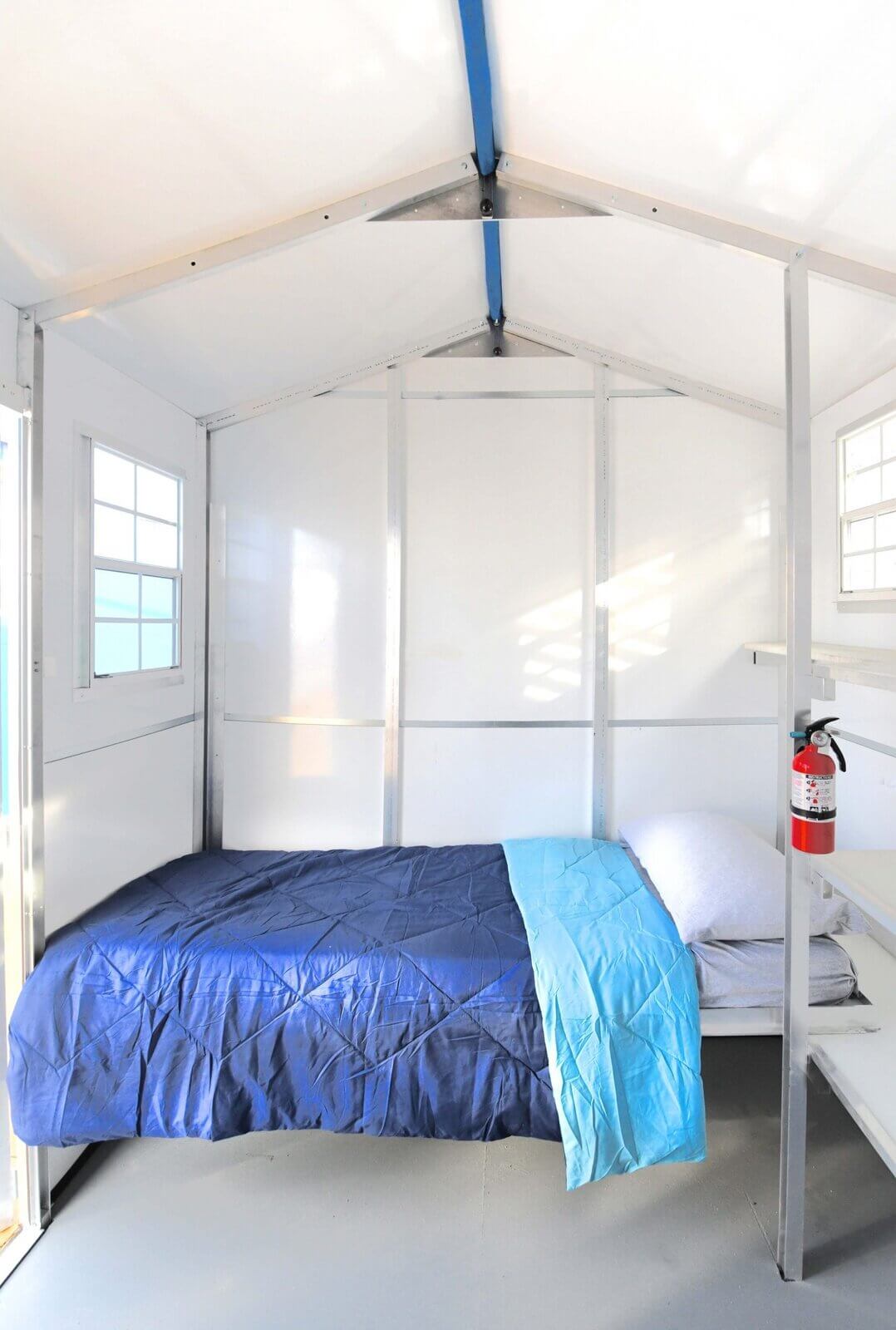 interior of a pallet shelter for homeless residents