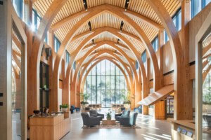 vaulted wood interior of a building lobby