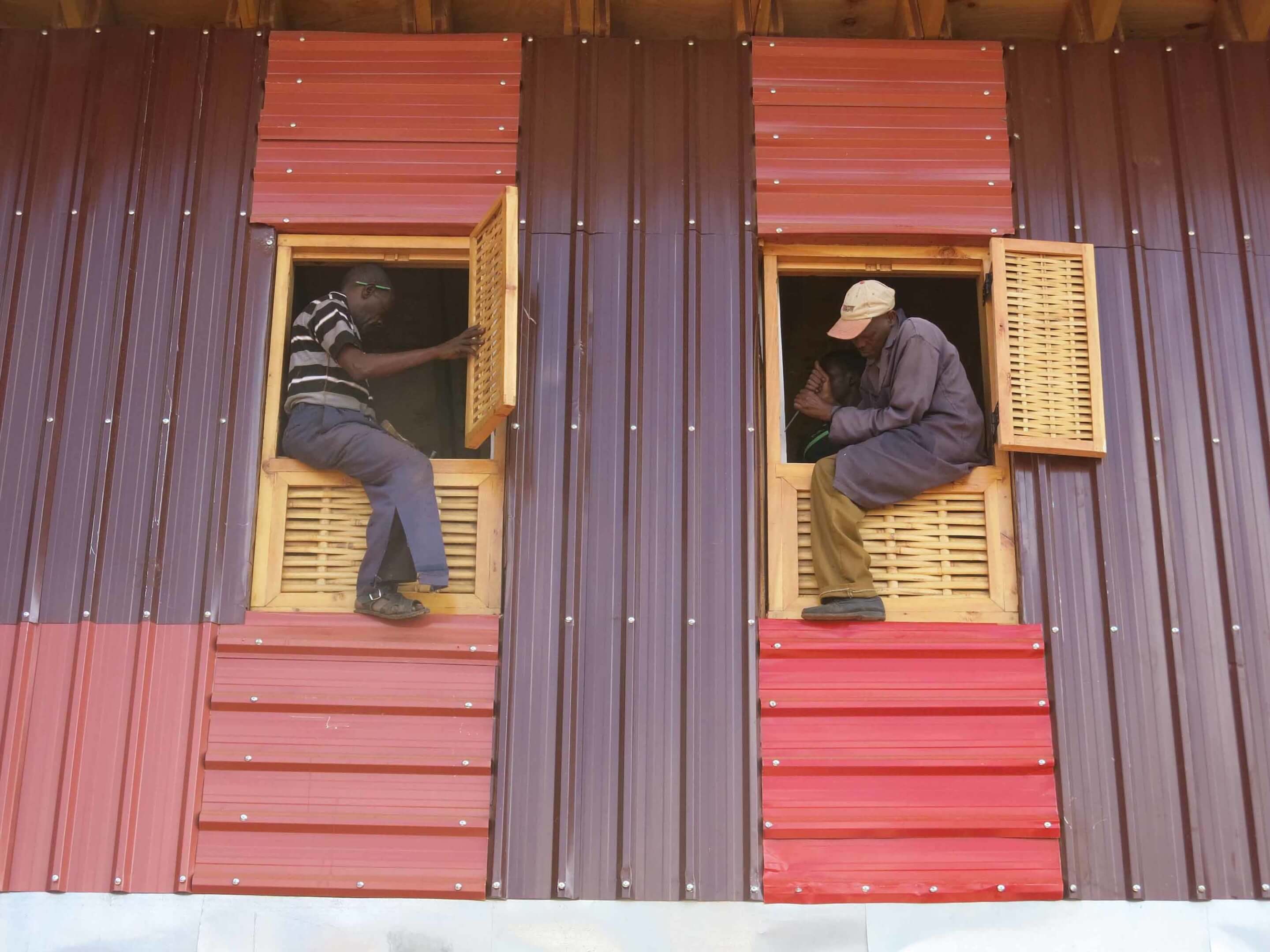 two men installing windows