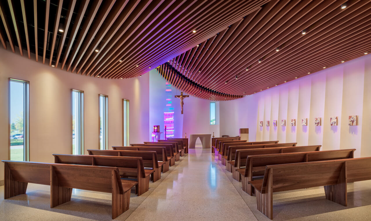 interior of a ply+ church with undulating ceiling