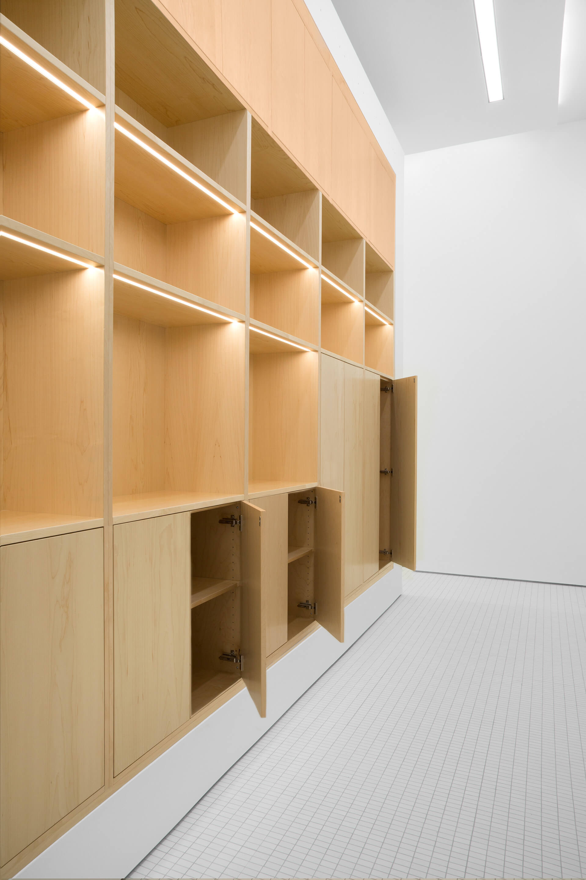 a wood partition wall with storage 