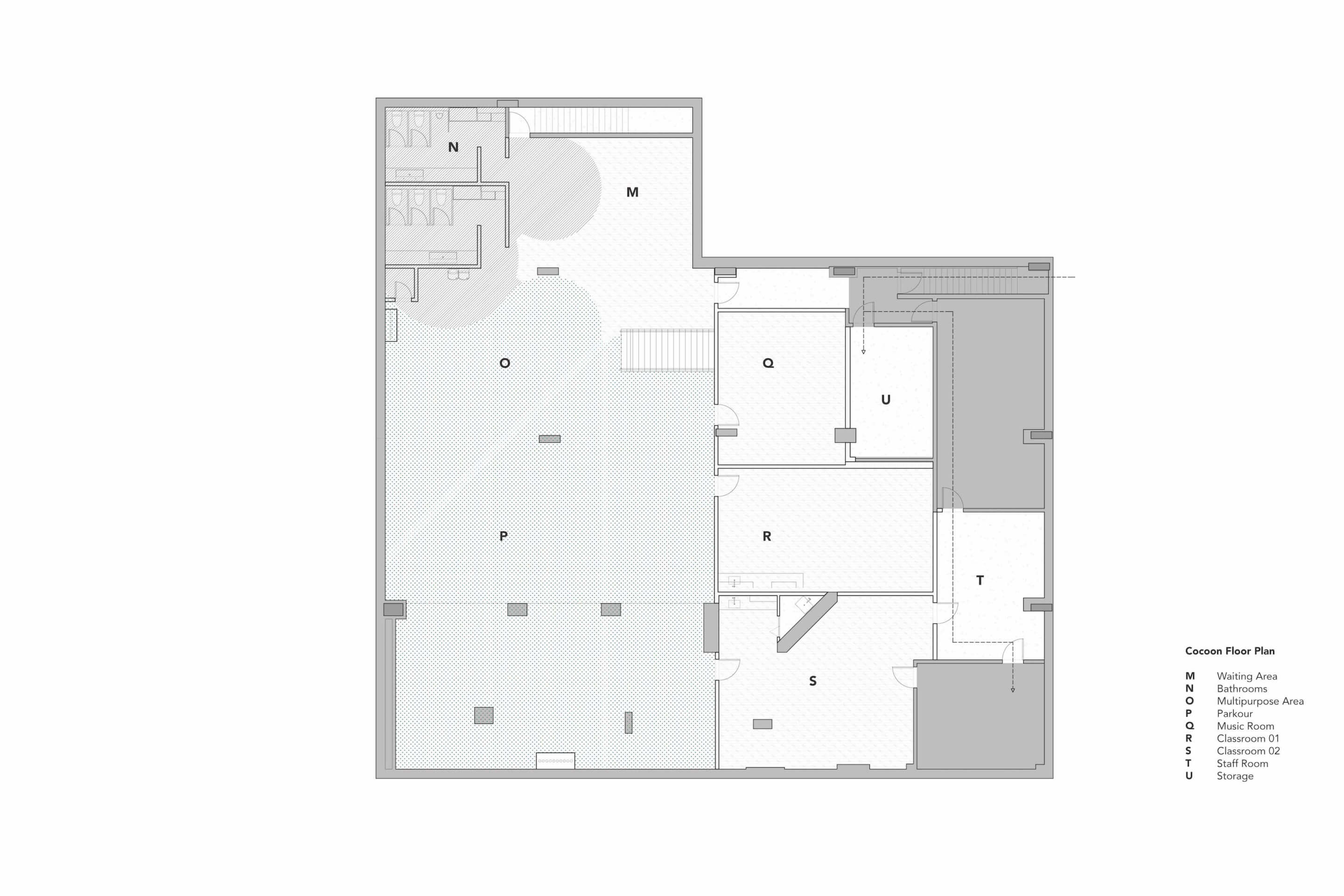 floor plan of an L-shaped basement with classrooms and bathrooms