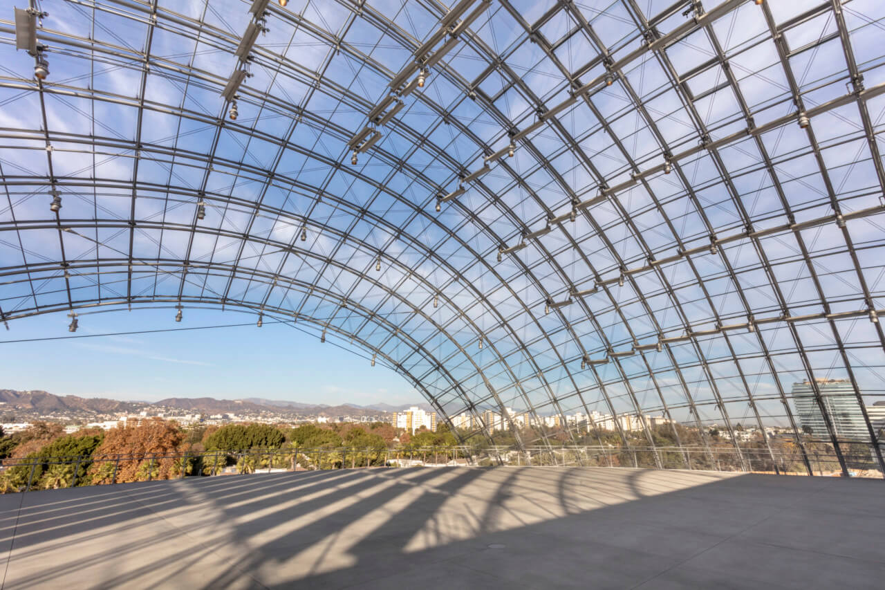 an open terrace covered by a glass dome