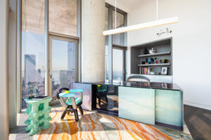Interior of an office at 56 leonard, a tower looking over manhattan, with colorful furniture designed by Dash Marshall